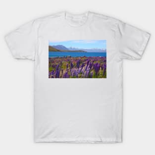 Lake Tekapo and wild flowering lupins T-Shirt